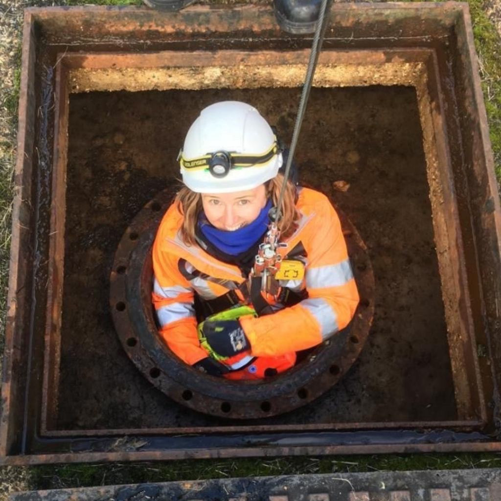 Zoe of Lifeline Rescue Solutions going down a tunnel, working in confined spaces.
