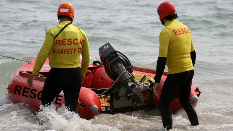 Two rescue team member on standby